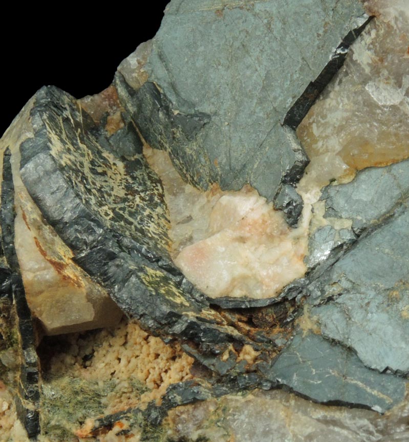 Detail view of mineral Ilmenite var. Washingtonite in Quartz for sale from 56th Street between Broadway and Sixth Avenue, Manhattan Island, New York City, New York County, New York