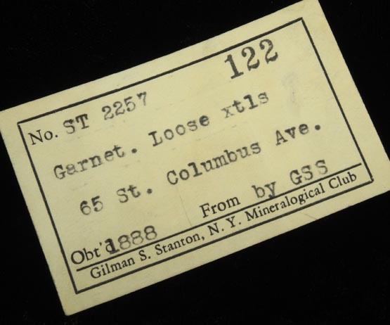 Detail view of mineral Almandine Garnet for sale from 65th Street at Columbus Avenue, Manhattan Island, New York City, New York County, New York