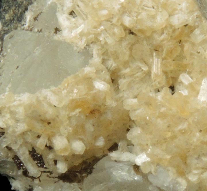 Detail view of mineral Stilbite on Calcite with (?) for sale from 63rd Street Subway Tunnel, Manhattan Island, New York City, New York County, New York