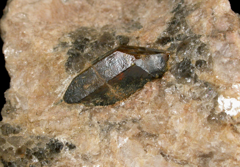 Monazite crystal 13 mm long from 171st Street at Washington Avenue, Manhattan, NY. 