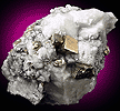 Mineral specimen: Pyrite in Franklin Marble from Lime Crest Quarry, Sparta, New Jersey.